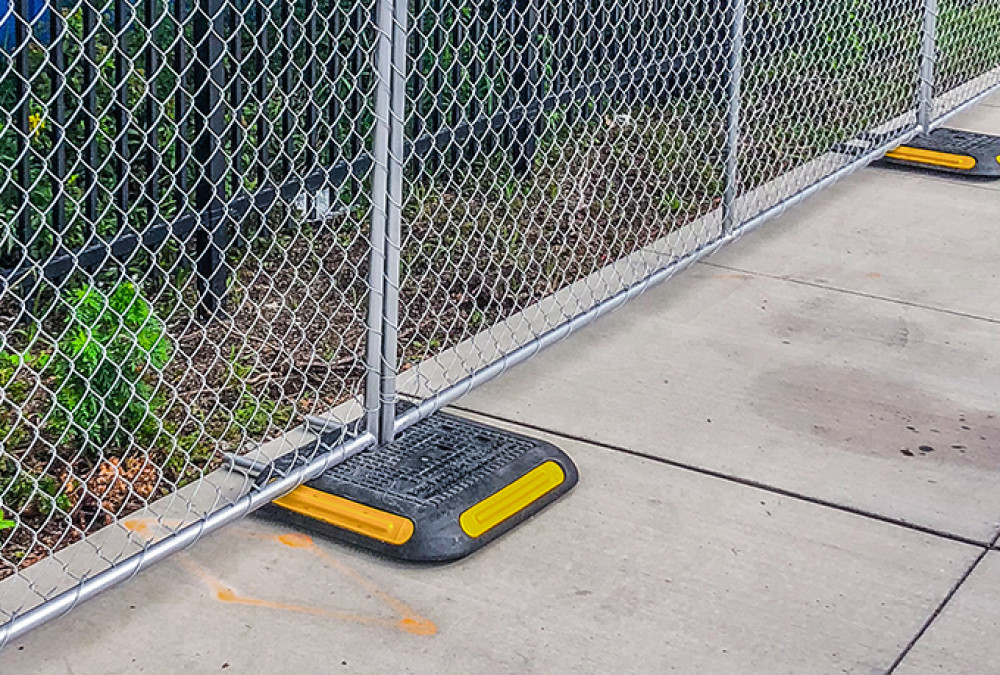 Dangers of using sandbags to secure barriers and fencing